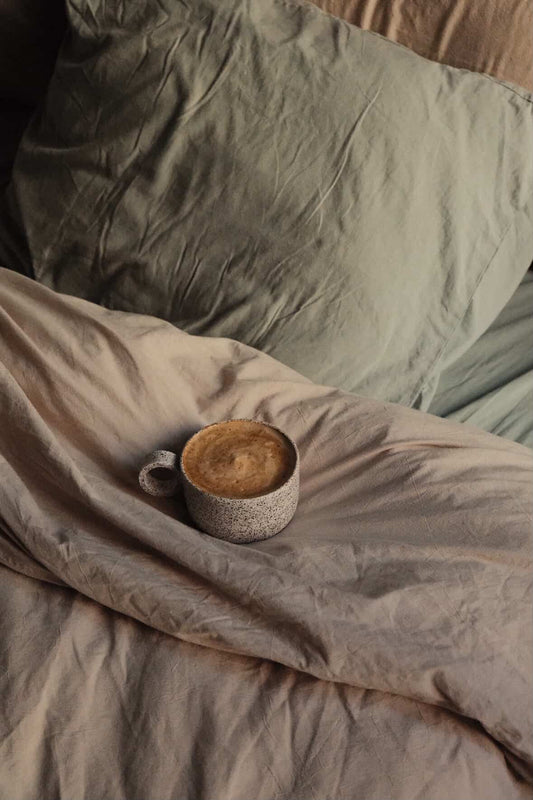 Tasse à petite anse ronde